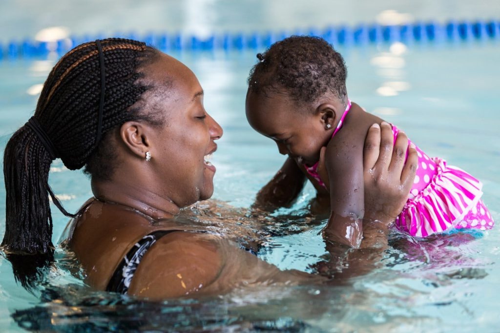 Mum with baby in the pool